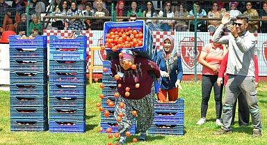 Domates kasası taşıma yarışmasında, kadınlar, erkeklere taş çıkarttı