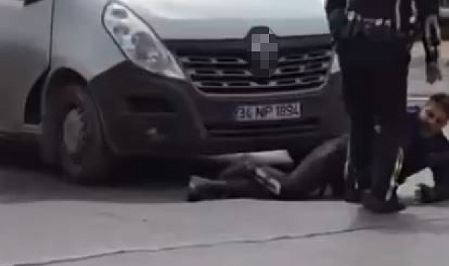 Durdurulmak istenen sürücü, kaputa tutunan zabıta memuruyla birlikte kaçmaya çalıştı