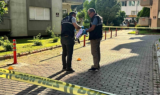 Emekli polis apartman görevlisini silahla yaraladı