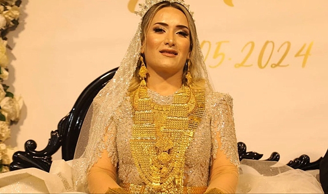 Kilolarca altın takılan gelin, hareket etmekte zorlandı