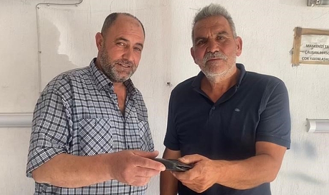 Bulduğu içi dolu para cüzdanını sahibine teslim etti