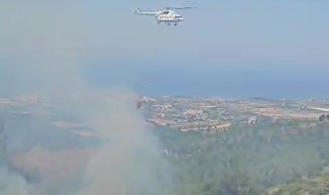 Orman yangını, helikopter ile müdahale edilerek kısa sürede söndürüldü