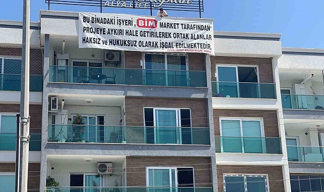 BİM&#039;e pankartlı protesto