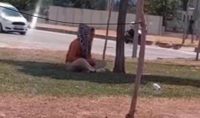 Kadın dilenci topladığı paraları sayarken cep telefonu kamerasına yakalandı