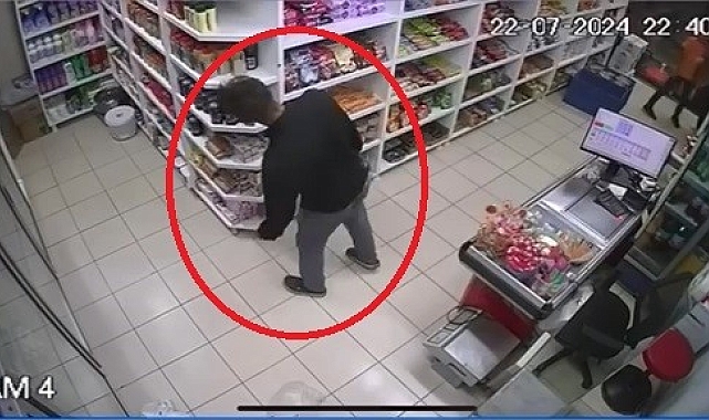 Markette telefon hırsızlığı kamerada