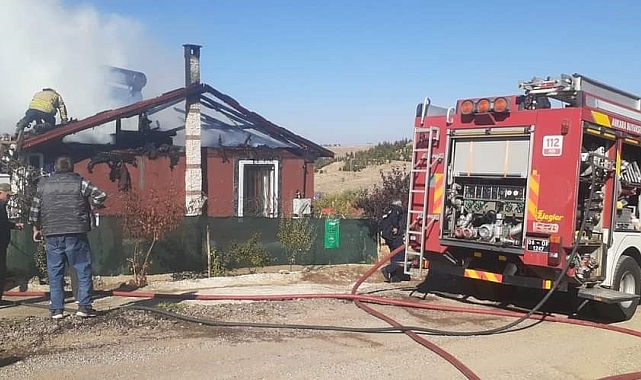 Evinin yanışını gözyaşları içinde izledi