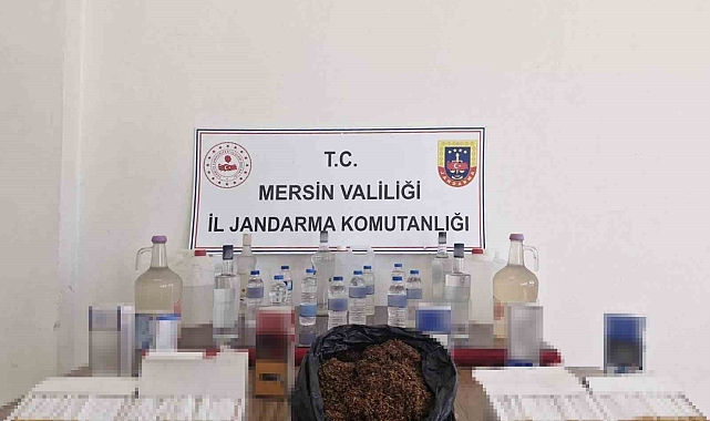 Mersin&#039;de kaçak makaron ile sahte içki ele geçirilirken bir şüpheli de yakalandı