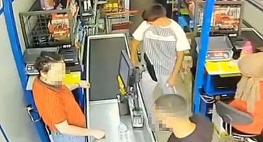 Bursa Mustafakemalpaşa'da BİM Kasiyerine Yumruklu Saldırı: Saldırgan Tutuklandı